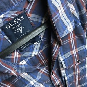 Guess.  Long sleeve snap buttons shirt